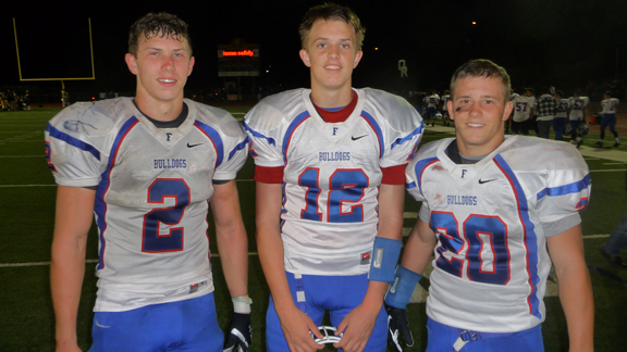 Folsom QB Jake Browning (12), the 2012 State Sophomore of the Year, is flanked by teammates Bailey Laolagi (also a sophomore) and junior receiver Troy Knox. Browning passed for 63 touchdowns and state-record 5,248 yards.