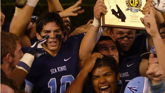 Senior Ryan Griffin (10) is among those going nuts for Corona del Mar after team was presented with CIF Southern Section Southern Division title plaque. Photo by Mark Tennis.