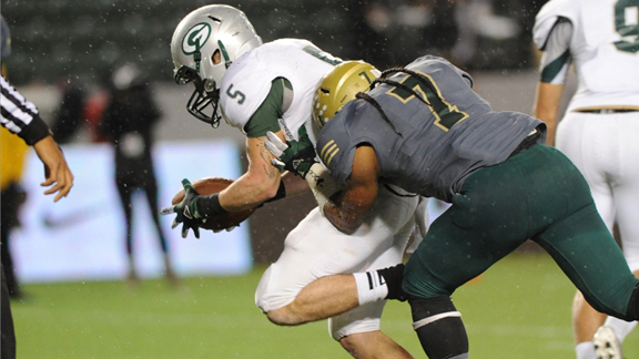 Johnny Cooley is about to cross the goal line for Granite Bay with 1:12 left for the winning touchdown in team's 21-20 win over Long Beach Poly in the CIF Division I state bowl championship. Photo by Scott Kurtz.