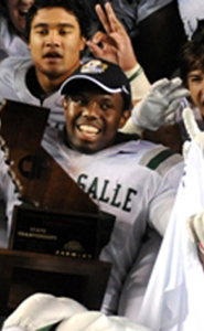 Hutchings had the CIF state title trophy in his lap during team photo. Teammate Tiapepe Vitale is just above him. Photo by Scott Kurtz.