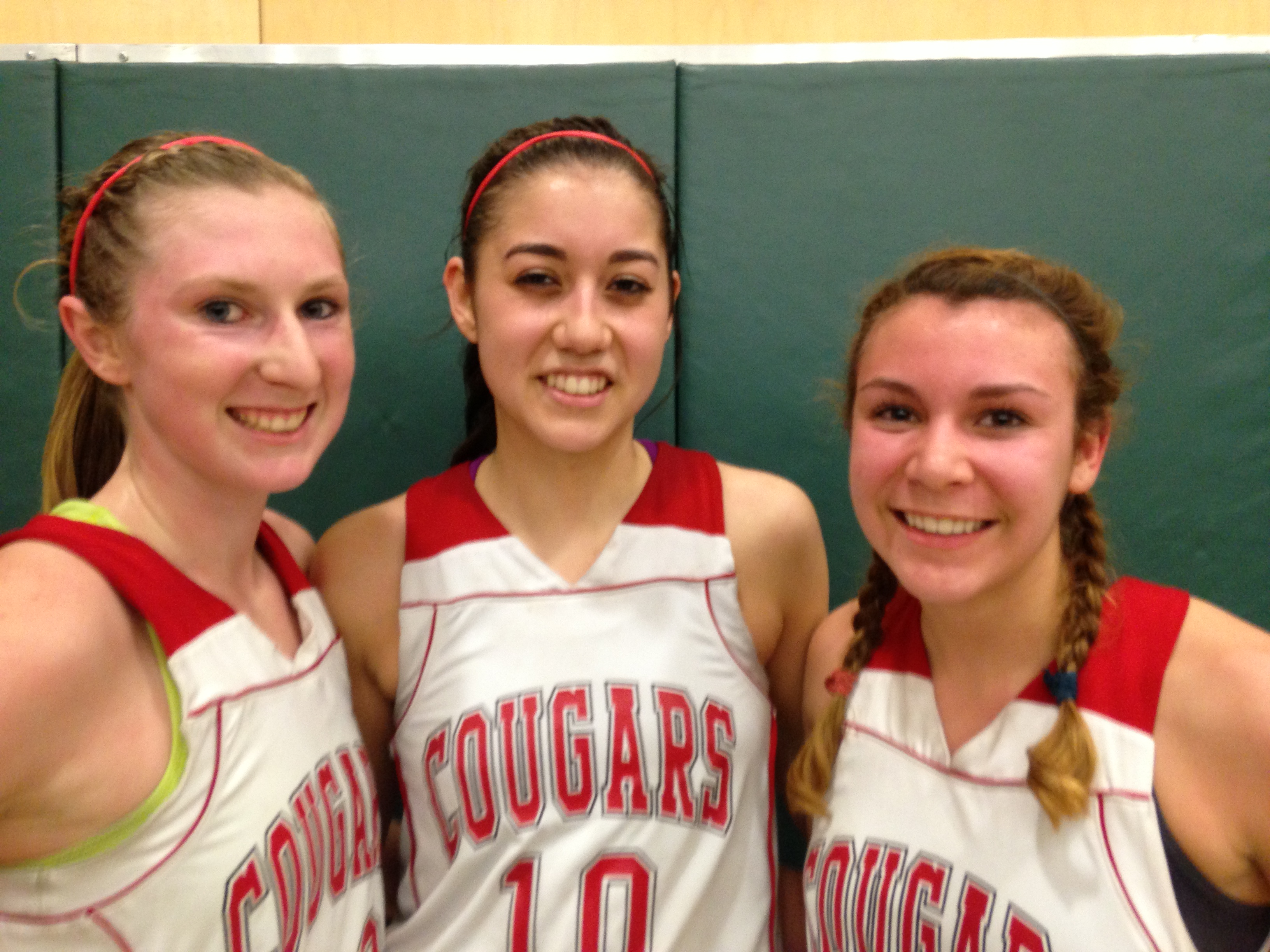 Leading Carondelet of Concord to the unofficial NorCal Division II title on Saturday were Mackenzie Cast, Lauren Nicolosi and Natalie Romeo. The Cougars play Stockton St. Mary's on Tuesday. Photo: Harold Abend.