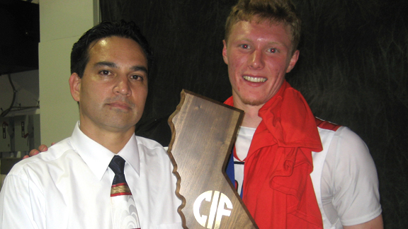 Pleasant Grove head coach John DePonte and senior Colfax Nordquist share a happy moment shortly after their team defeated Santa Monica for the 2013 CIF Division I state championship on Friday night.