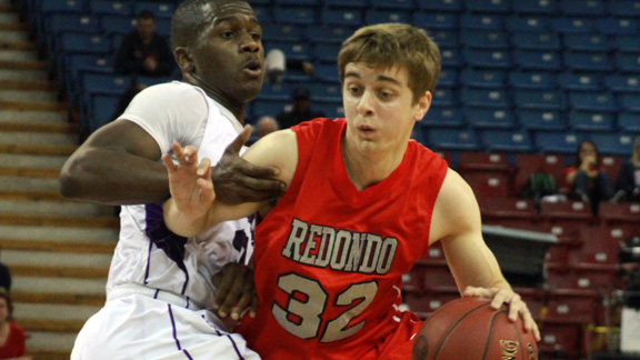 Junior guard Ian Fox of Redondo tries to get past the check of College Park's A.J. Newell in CIF Division II state championship game. Redondo won the game, but ended No. 2 in final D2 state rankings. Photo: Willie Eashman.