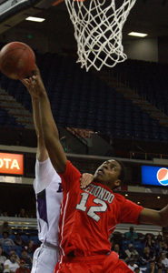 Jeremiah Headley of Redondo gets all ball on key blocked shot in the fourth quarter of team's D2 boys title game win over College Park. Photo: Willie Eashman.