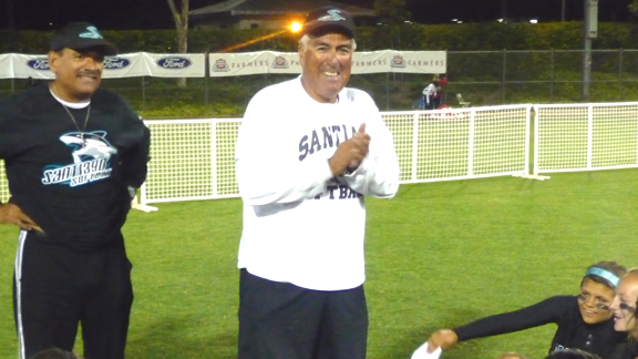 After four years of coaching both girls basketball and softball, Corona Santiago's John Perez (right) is concentrating on guiding one of the state's top softball programs.