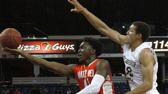 Mater Dei's Stanley Johnson attacks the basket in front of Mitty's Aaron Gordon in last year's CIF Open Division state final. Photo: Willie Eashman.