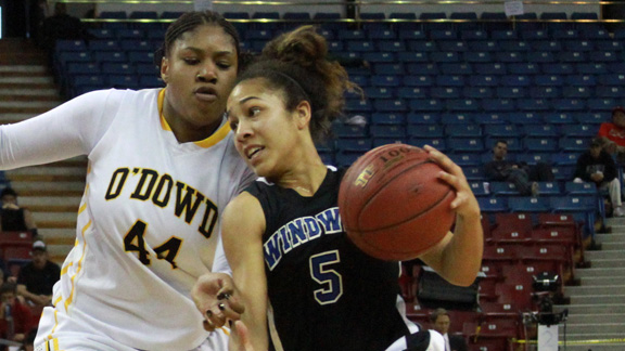 Macchiati Smith of Los Angeles Windward gets her path blocked by Bishop O'Dowd's K.C. Waters during CIF Open Division girls showdown last week at Sleep Train Arena. Photo: Willie Eashman.