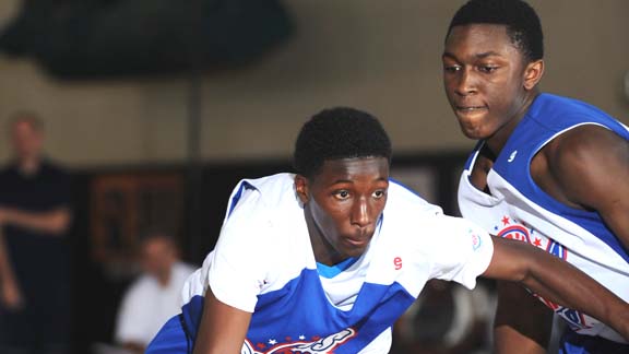 St. John Bosco's Daniel Hamilton makes a move on Mater Dei's Stanley Johnson at last year's Pangos All-American Camp. The Trinity League rivals are among the plethora of high major prospects set to attend this year's camp Saturday and Sunday in Long Beach.  
