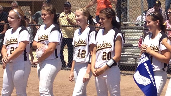 Hughson softball players are about to collect championship gear after their team won CIF Sac-Joaquin Section title. Photo: Paul Muyskens.