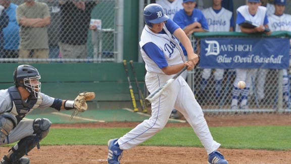 Matt Trask of Davis is about to connect for a hit against Elk Grove. He and his team debuted at No. 20 in this week's rankings. Photo courtesy Trask family.