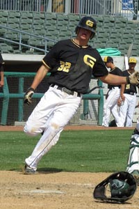 Dan Whitney is about to score a run for No. 9 Granada is one of the team's 24 wins. Photo: Dan Badders (courtesy school).