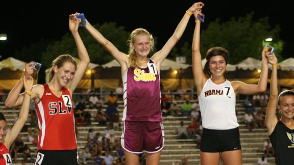 State Junior Athlete of the Year Sarah Baxter is flanked by Anna Maxwell and Sydney Segal after she won third straight CIF 3200-meter state title. Photo: John Wareham (L.A. Daily News).