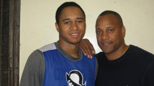 El Camino Real's Julian Richardson is with his father, former UCLA and NBA point guard and Philadelphia prep legend Jerome "Pooh" Richardson. El Camino Real won L.A. City title on Saturday night. Photo: Ronnie Flores 