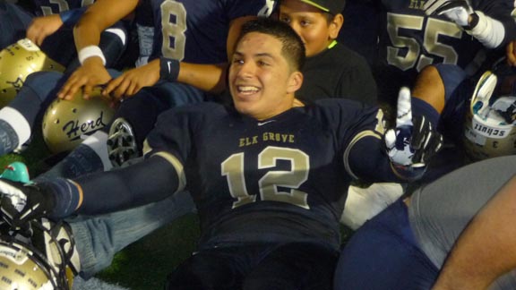 Senior LB/TE Noah Letuligasenoa celebrates with Elk Grove teammates last season after the team earned spot in CIF Sac-Joaquin Section finals. Photo: Mark Tennis.