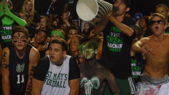Fans in the student section at St. Mary's of Stockton had fun all night even though their team didn't have much success in loss to De La Salle of Concord. Photo: Mark Tennis.