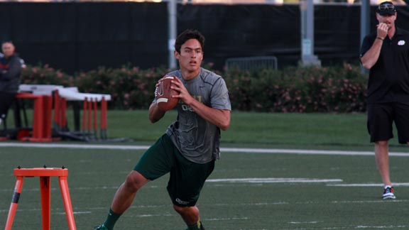 QB Cade Apsay from D2 South ranked Canyon of Canyon Country goes through drill with ESPN's Trent Dilfer watching closely. Canyon plays Valencia this week. Photo: Willie Eashman.