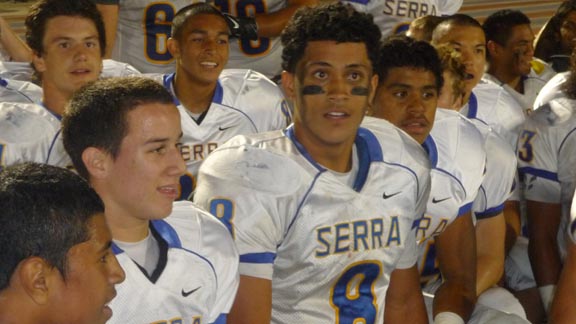 Kava Cassidy (No. 8) and the rest of the team at Serra of San Mateo listen to one of their coaches after victorious outing from earlier in the season. Photo: Mark Tennis.