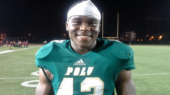 Omari Lyles is all smiles after he helped his team at Long Beach Poly defeat Orange Lutheran in the CIFSS Pac-5 Division playoffs. Photo: Ronnie Flores.