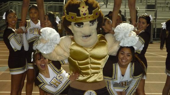 No, the mascot formerly used by Burger King is not back in high school. This is the Stagg of Stockton Delta King, who is surrounded by cheerleaders after a big TD in Stagg's 32-14 win on Friday night over Beyer of Modesto in the CIF Sac-Joaquin D1 playoffs. Photo: Mark Tennis.