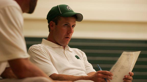 First-year De La Salle head coach Justin Alumbaugh checks over pregame notes prior to his first game leading the legendary program. Photo: Jonathan Hawthorne/SportStars.