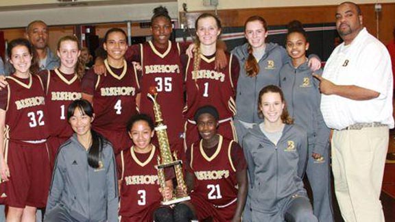 Members of the La Jolla Bishop's girls basketball team celebrate after winning a preseason tournament. Photo: Courtesy of school.