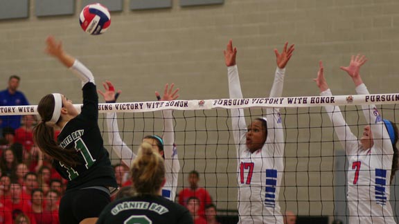 Cally Chamberlain of Granite Bay goes for the kill over the Los Alamitos block during CIF Division I state championship last Saturday in Orange. Photo: Courtesy Student Sports.