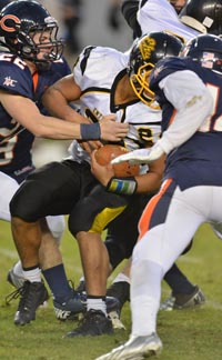 Enterprise running back Izzy Matthew found the going tough against Chaminade's defense. Photo: Scott Kurtz.