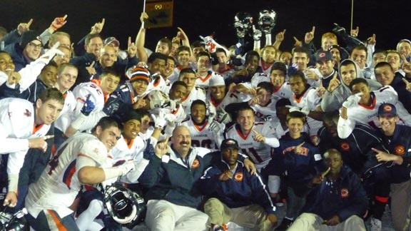 Chaminade players and coaches have a great time taking title photo after they topped Gardena Serra on Friday night.