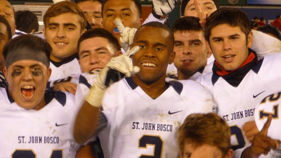 Jaleel Wadood (with No. 1 index finger) is in the midst of team photo shoot following St. John Bosco's win on Saturday over Mater Dei of Santa Ana. Photo: Mark Tennis.