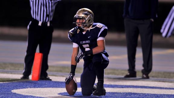 St. John Bosco running back Sean McGrew pauses take some breaths after he scored one of his long TD runs during game vs. Corona Centennial. Photo: Scott Kurtz.