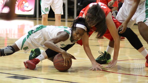 In any game involving St. Mary's of Stockton, there are many scrums for loose balls. This one in the West Coast Jamboree Platinum Division championship against Mater Dei involved Mi'Cole Clayton of the Rams and Alli Rosenblum of the Monarchs. Photo: Willie Eashman.