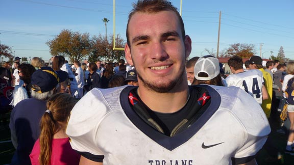 Fullback Tanner Hughes scored three touchdowns for Oak Ridge in its section semifinal win against Pleasant Grove and also shined last year as a junior (above) when the Trojans beat Burbank of Sacramento (when Burbank was 12-0) in the section semifinals. Photo: Mark Tennis.