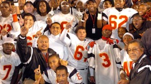 Players from the 2005 Dominguez of Compton football team (including Richard Sherman) plus head coach Willie Donnerson (in lower right hand corner) celebrate after winning CIF Southern Section Division III title. Photo: Scott Kurtz.