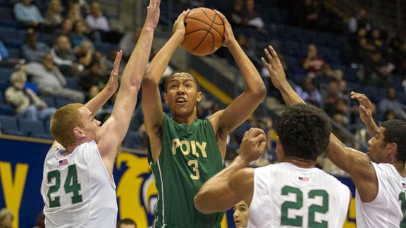 Junior center Jordan Dallas of Long Beach Poly looks to operate against the tough defense of Concord De La Salle during MLK Classic played at Cal. Photo: Everett Bass Photo.