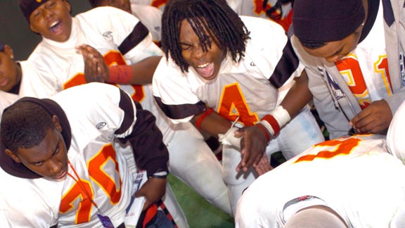 Richard Sherman (No. 4) of the 2005 Dominguez of Compton football team is shown clapping with teammates just after one of their games. Sherman is now perhaps the No. 1 cornerback in the NFL with the Seattle Seahawks. Photo: Scott Kurtz.