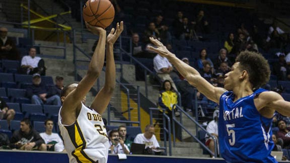 Big-time junior Ivan Rabb from Bishop O'Dowd of Oakland shoots fadeaway jumper in game against Capital Christian of Sacramento. Photo: Everett Bass Photo of Oakland.