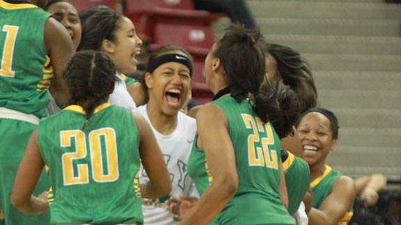 Long Beach Poly girls whoop it up seconds after the final horn in the CIF Open Division state final. The Jackrabbits defeated Salesian of Richmond 70-52. Photo: Willie Eashman.