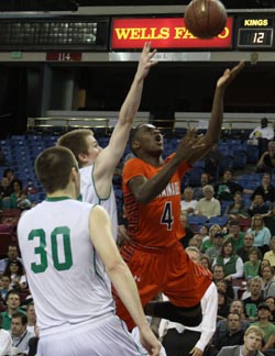 Michael Oguine of Chaminade knifes through the Drake defense during CIF D3 state final. Photo: Willie Eashman.