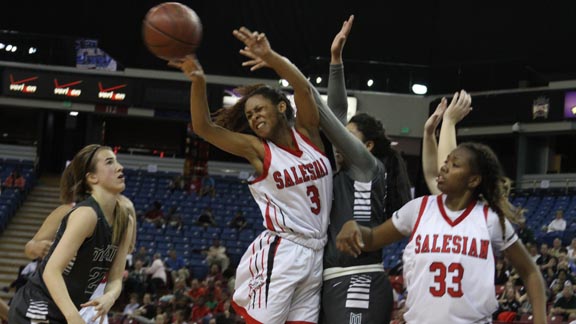 Minyon Moore from Salesian of Richmond fights to collect a pass during CIF NorCal Open Division final vs. Miramonte of Orinda on Saturday in Sacramento. Photo: Willie Eashman.