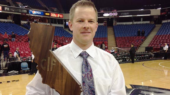 Head coach Nick Jones from Monte Vista of Danville poses with CIF Division I state title trophy after team's victory in Sacramento over Centennial of Corona. Photo: Harold Abend.
