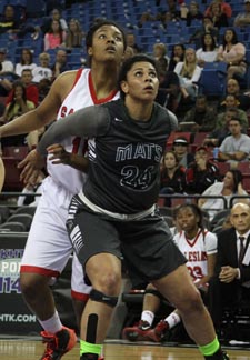 Battling for rebounding position during CIF NorCal Open Division final are Miramonte's Briana Alford and Salesian's Zoe Correal. Photo: Willie Eashman.