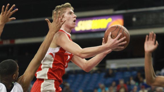 Junior guard Rex Pflueger flies to the rim for Mater Dei during CIF Open Division state final vs. Bishop O'Dowd of Oakland. Photo: Willie Eashman.