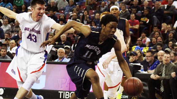 Rodney Henderson from St. John Bosco of Bellflower chases a loose ball against Folsom during CIF Division II state final at Sleep Train Arena in Sacramento. Photo: Willie Eashman.