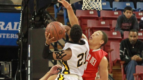 La'vette Parker of Mater Dei, an all-state honoree in Division I, plays defense against Bishop O'Dowd Juwan Anderson, an honoree in Division III, during CIF state final. Photo: Willie Eashman.