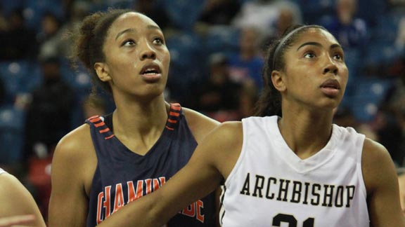 Two players from this year's Division II all-state team battling for position on a rebound in the CIF D2 state final in Sacramento are Devin Stanback from Chaminade of West Hills and Kelli Hayes from Archbishop Mitty of San Jose. Photo: Willie Eashman.