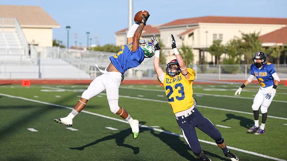 Bryan Pascual of the North team comes up with an interception on the first play run by the South team during Saturday's Lions All-Star Classic in Tracy. Photo: Stu Jossey Photography.