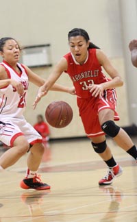 Christina Chenault from Carondelet of Concord starred in basketball and in track & field during 2013-14 school year. She is the younger sister of 2012-13 State Athlete of the Year Chelsea Chenault, who shined in swimming. Photo: Willie Eashman.