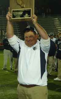 Roger Canepa of Modesto Central Catholic holds up NorCal regional title plaque. Photo: Mark Tennis.