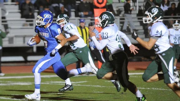 Kava Cassidy from preseason No. 19 Serra of San Mateo gets running room during West Catholic Athletic League contest. Photo: Prep2Prep.com.