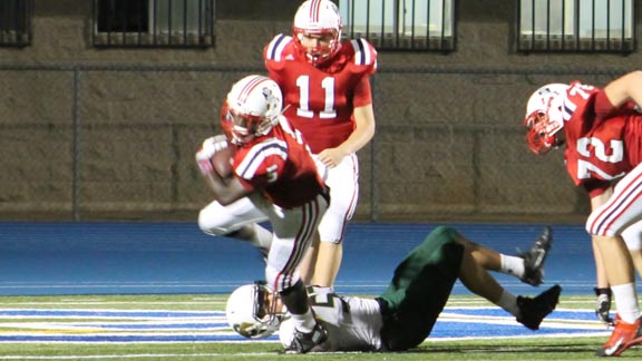 Christian of El Cajon's Adrian Petty breaks this tackle and then goes on for a state record-tying 99-yard TD run. Patriots remain No. 1 in this week's D4 South bowl rankings. For more on Petty's play, CLICK HERE. Photo: Amy Wilson/Special to East County Californian.